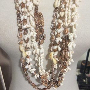 Four 17" shell necklaces